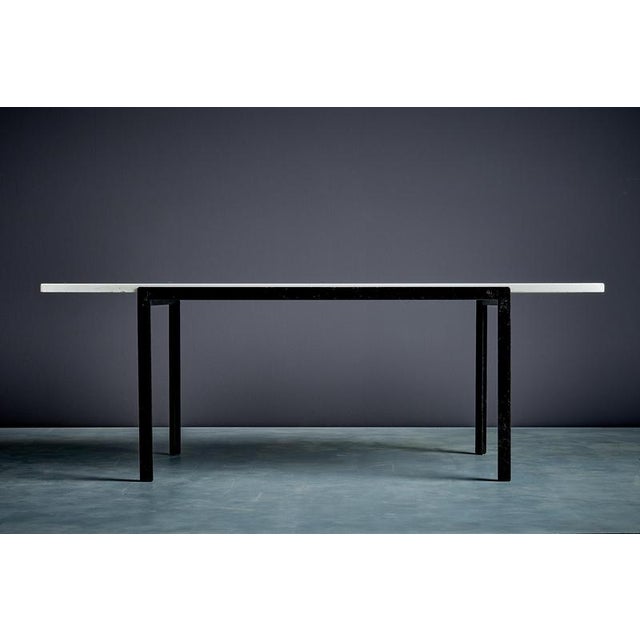 Florence Knoll T-Angle coffee table with marble top, Knoll International. Black enameled steel base with the signature...