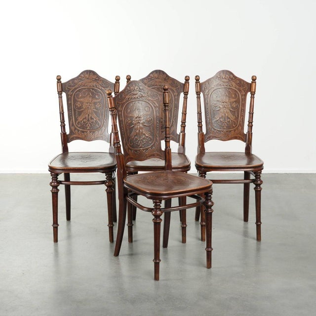 This set of four antique bistro chairs from the late 18th century, in the Art Nouveau style, was designed by Jakob & Josef...
