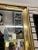 1980’s Large gold chrome framed mirror with an Asian flair. The picture of a gesha and her man seems to be painted on the...