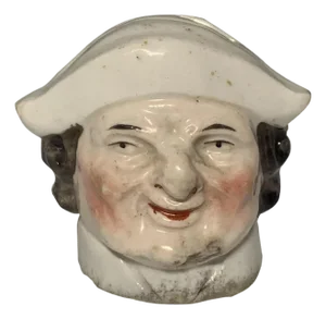 Antique Staffordshire Head Penny Bank: 19th Century Porcelain Coin Bank