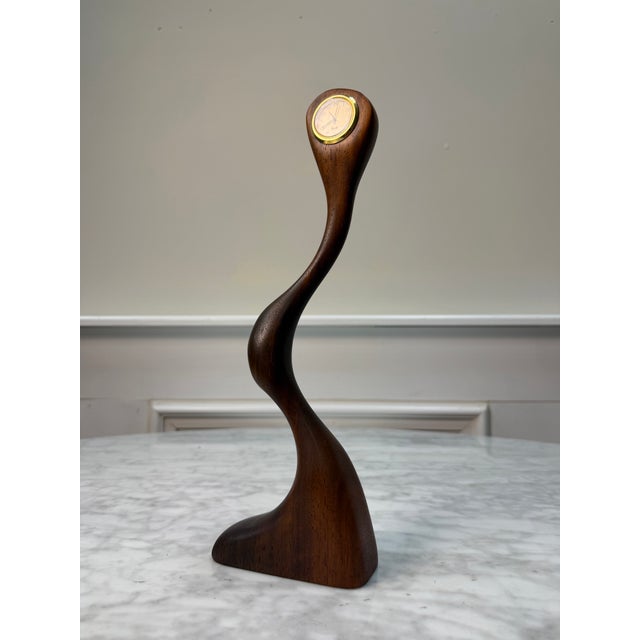 Bring organic modernism to your space with this striking "Loch Clock" by Sherman Studio. Hand-carved from a single piece...