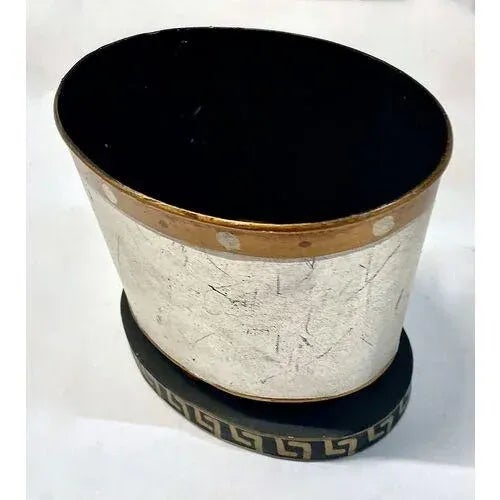 Antique handsome hand-painted silver and gold Greek key cachepot with ball feet between plinth and cachepot base. No...