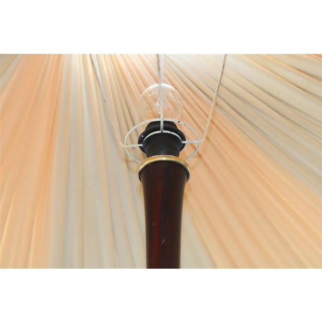 Italian Mahogany and Brass Pedestal Floor Lamp, 1950s, in Flawless conditions. Designed 1950 to 1959 European Plug (up to...