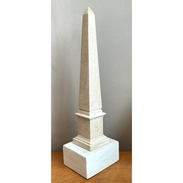 This vintage decorative obelisk follows a classical architectural silhouette, rising in a slender, four-sided tapered...