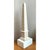 This vintage decorative obelisk follows a classical architectural silhouette, rising in a slender, four-sided tapered...