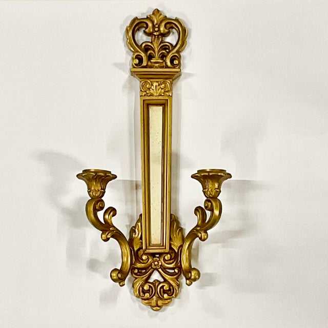 We love Neoclassical decor items. This is a Mid-Century 2-arm taper candle holder wall sconce from American manufacturer...