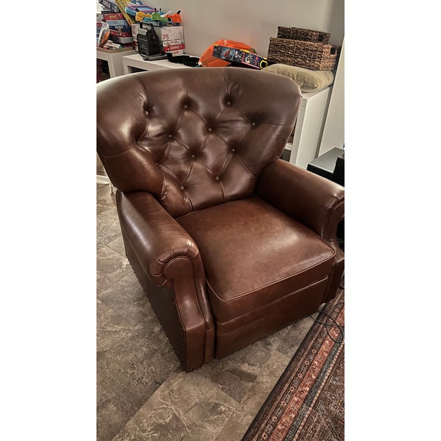 Details: * Color: Statesville Molasses (top-grain leather) * Swivel: Full 360° * Recline: Manual * Cushion: Down-blend for...