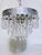 Make a sleek, sophisticated statement with this stunning mid-century tiered chrome waterfall chandelier. Showcasing a...