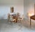A figured round marble top on a Kreiss "Duchess" fluted pedestal table base. Perfect as a game table, breakfast table,...
