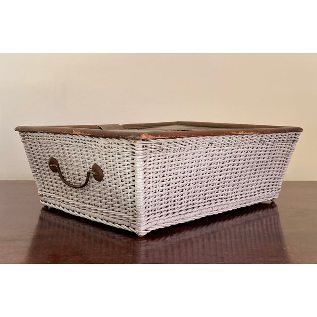 Early 20th century Mark Cross green leather and white wicker sewing basket with silk lining. Sarcophagus shape with canted...