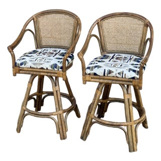Pair of 1970s Vintage Rattan & Cane Swivel Bar Stools With Upholstered Seats For Sale