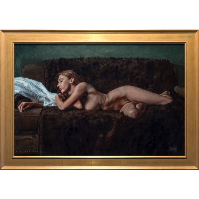 The artwork presents a serene figure reclining on a textured brown fur throw, exuding a sense of calm and intimacy. The...