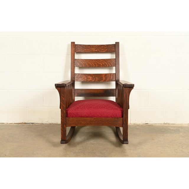 A gorgeous antique Mission or Arts & Crafts period rocking chair By Lifetime Furniture USA, Circa 1910 Quarter sawn oak,...