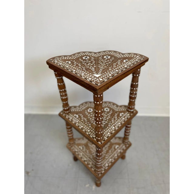 This Shelving unit Features a Bright White Floral Motif. Possibly She’ll Inlay , Possibly From India. Makers Mark and...