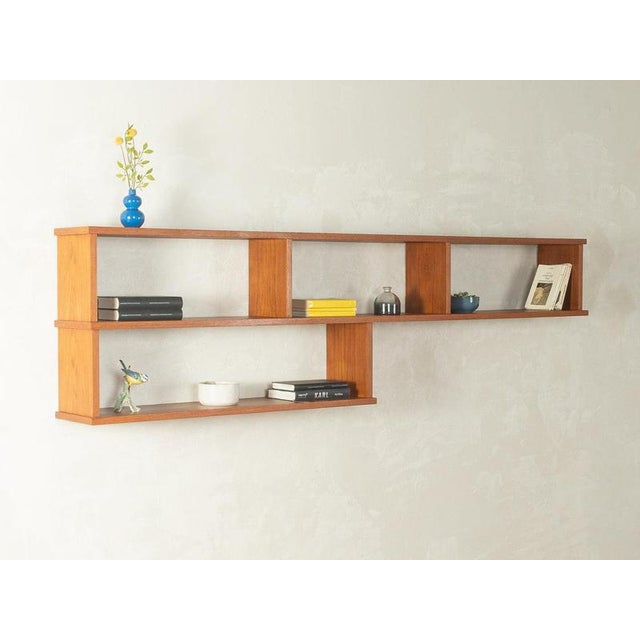 1960s wall shelf very good workmanshiphigh-quality materialsMade in Germany Width: 200 cm Height: 55 cm Depth: 22 cm This...