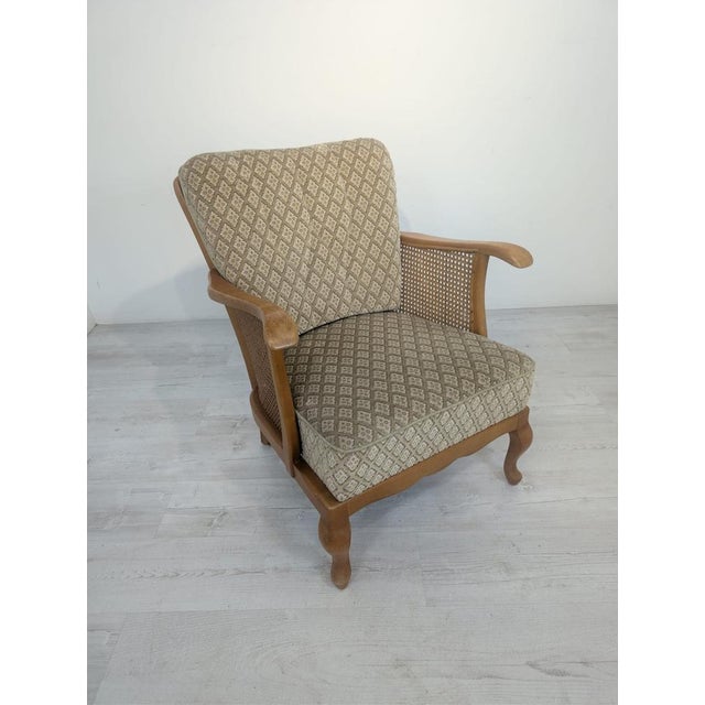 Chippendale Armchair with Raffia in Antique Style Stylish, antique armchair in the Chippendale style. Made of rattan and...