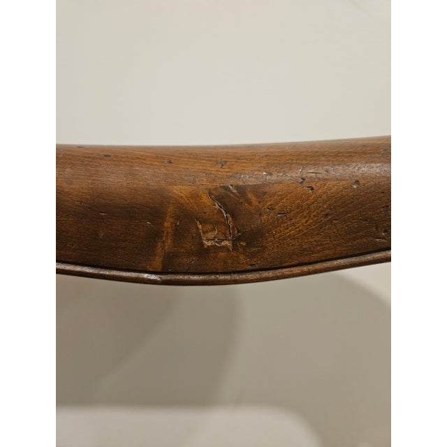 Elevate your space with this stunning Mid-Century Italian Rococo Revival side chair. Featuring a classic "Yoke" back and...