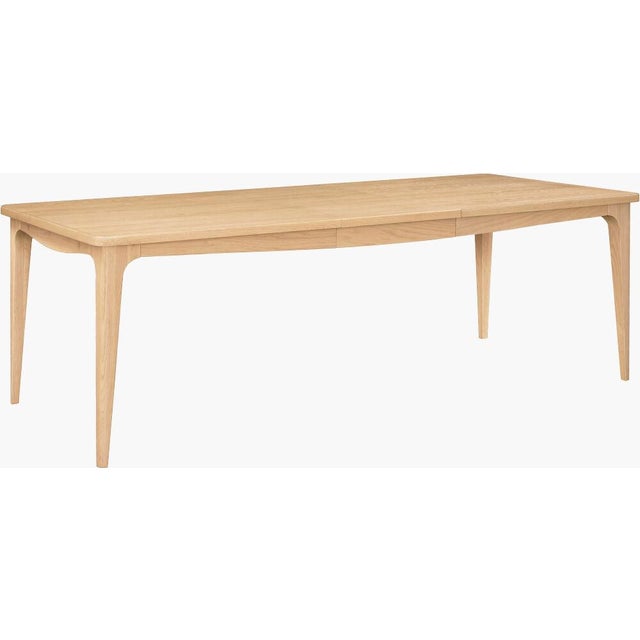 Introducing the Mollie Dining Table, a stunning centerpiece that effortlessly elevates any dining space with its elegant...