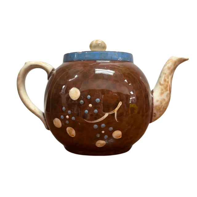A charming vintage Arthur Wood teapot showcasing the warm, inviting character for which the celebrated English pottery is...