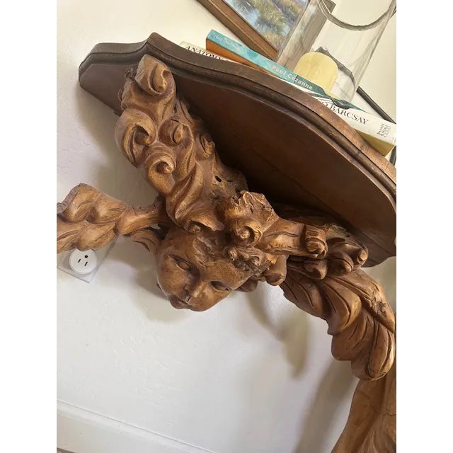 Beautiful hand carved hard wood angel. She is great in a guest bath, hanging higher so she is more visible, offering a...