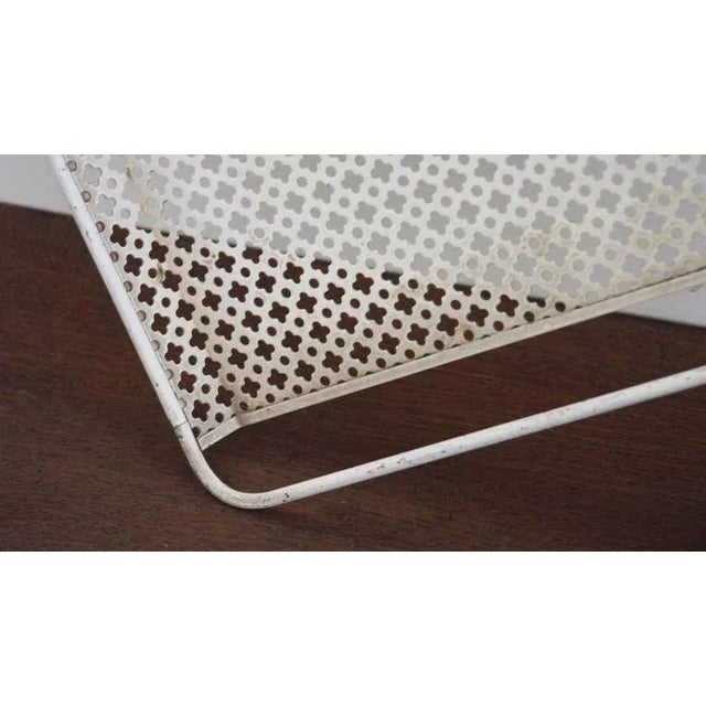 Tray by Mathieu Matégot in perforated metal sheet. This piece is attributed to the mentioned designer/maker. It has no...