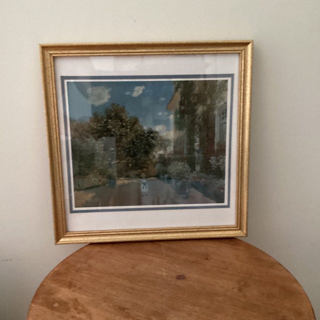 This beautiful Print by Claude Monet captures the serene and vibrant essence of a garden. The artwork features the...