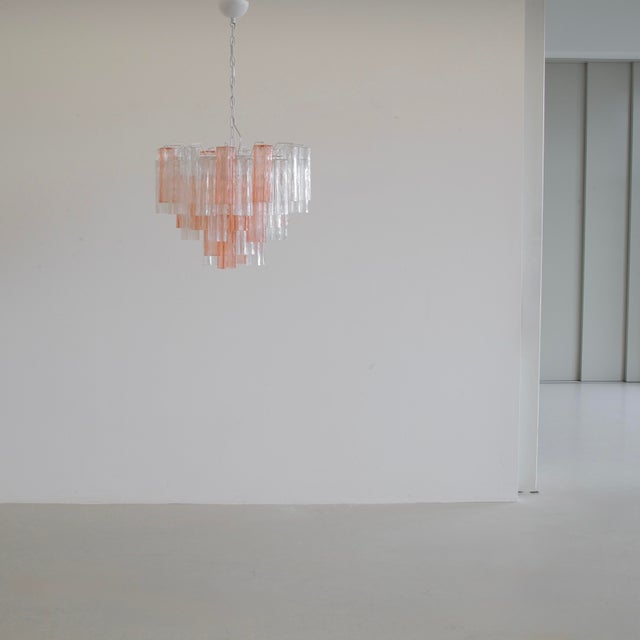 Chandelier with star-shaped 'Tronchi' glass pieces, Murano, Italy. Large chandelier with white painted metal structure,...