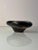 This sculptural ashtray in grey glass is a fascinating collector's item of Czechoslovakian post-war design, created by the...