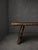 Impressive large dining table with a strong rustic and Brutalist appearance. The table features a substantial solid wooden...