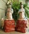 These statues are a beautifully rendered, very rare pair of mid-20th century porcelain statues depicting Quan-Yin...