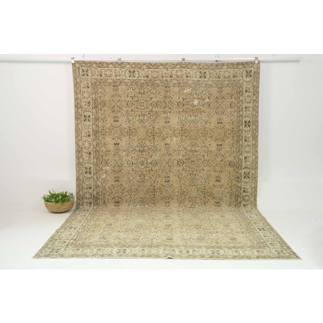 Vintage Hand-Knotted area rug is a semi-antique vintage area rug. The '70s Eastern region of Anatolian's unique rug is...