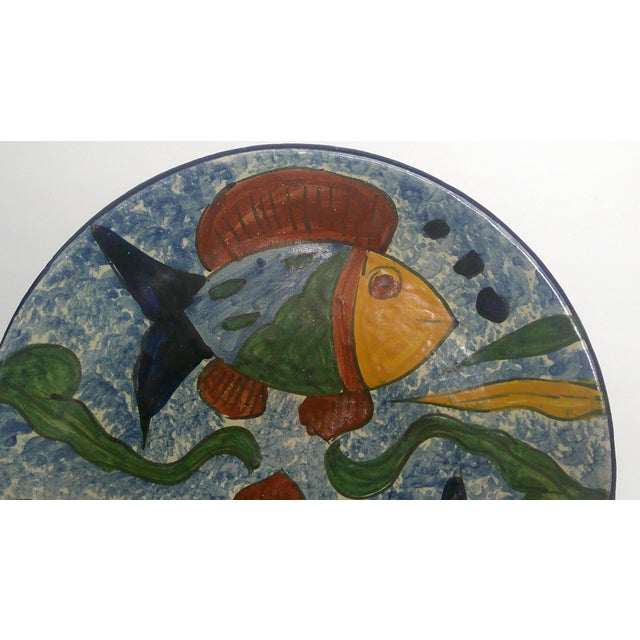 Vintage Mexican Pottery Fish Plate Folk Art Hand Painted Large 12” Dia This Mexican folk art-style features a hand-painted...