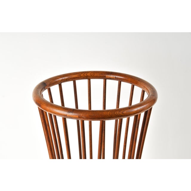 Incredibly beautiful statement piece of functional antique decor. This oak umbrella stand is sturdy and features...