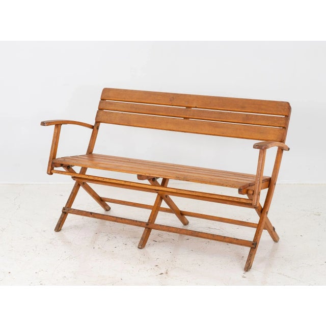 A period Bauhaus beech wood folding bench. Made in Germany in the 1930s. 17" seat height. Wear consistent with age and use.
