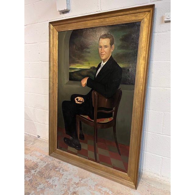 Handsome oversized, artist signed, vintage sitting portrait of a young man custom framed in a chunky gilt frame. Truly, a...