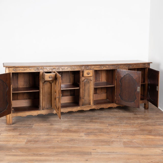 This French long sideboard is crafted in oak and offers a traditional French country look in an impressive scale measuring...