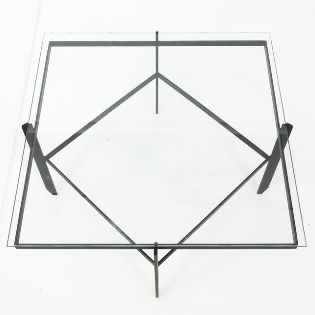 This Mid-Century cocktail table is a sleek and stylish piece that would elevate any living space. The table features a...