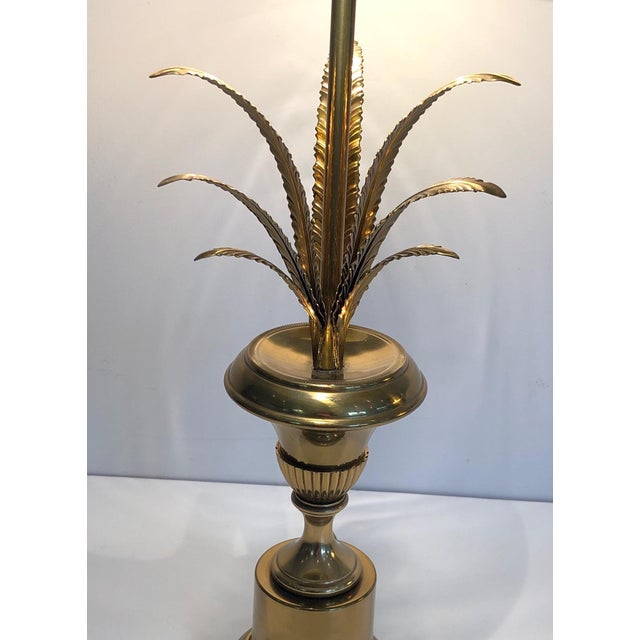 This very nice and elegant neoclassical style palm tree table lamp is made of brass. This is a French work in the Style of...