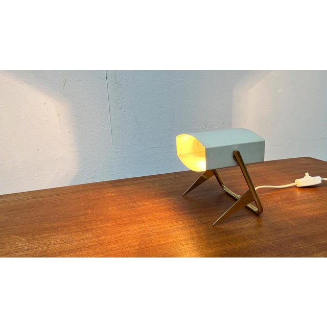 Rare table lamp after a design by Jaques Biny from the 1960s for Lita, France (attributed). A simple and well thought -out...