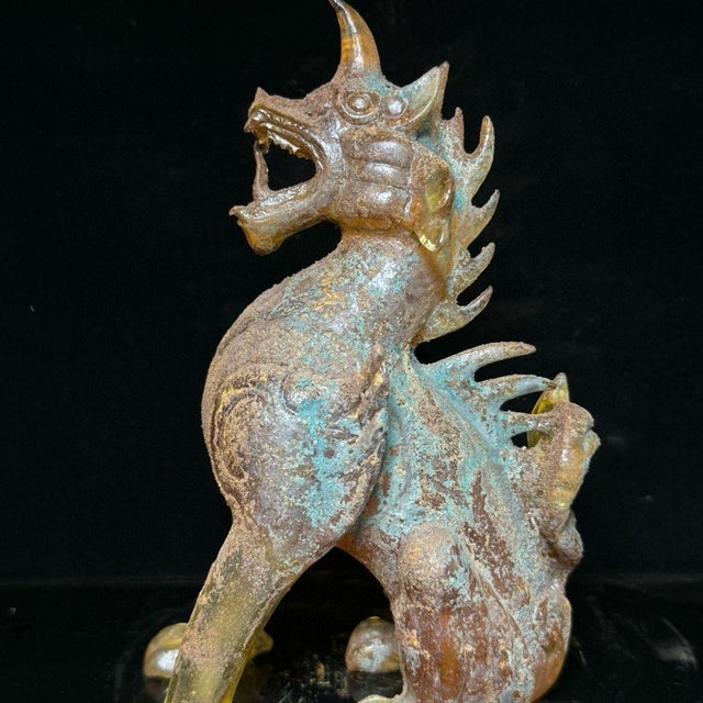 This striking antique glass sculpture depicts a roaring mythical guardian beast, traditionally known as a "Hou" or...