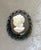 1960s-70s black/white iridescent cameo brooch. Excellent condition.