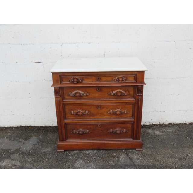 This classic Chest is made out of wood, solid wood, solid walnut, veneer, and marble. It has has a lovely Victorian...
