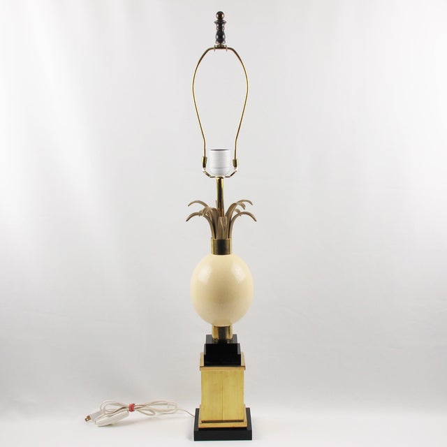 Step into the world of timeless design with this extraordinary tall table lamp by Maison Charles et Fils, Paris—an...