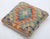 A one-of-a-kind handwoven Afghan wool kilim accent pillow featuring stacked diamonds in teal, red and gold. Cut and sewn...