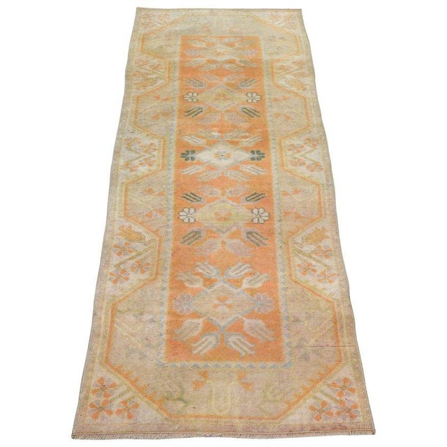 Hand-knotted with care using traditional rug-making techniques, this wool rug blends timeless craftsmanship with a modern...