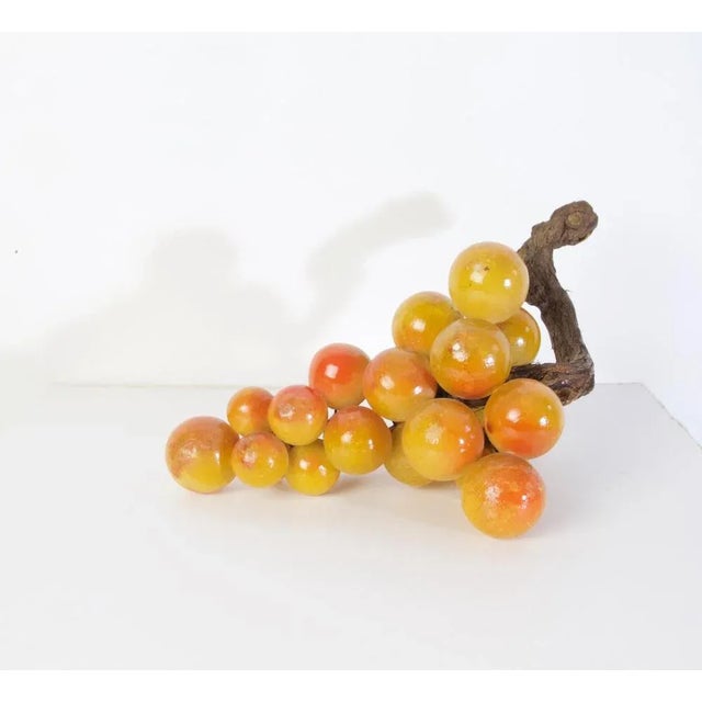 Original midcentury decorative large cluster of grapes in painted alabaster with an olive branch for stem.