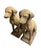 An exceptional pair of vintage mid-20th-century cast stone garden statues depicting seated hunting hounds, likely Pointers...