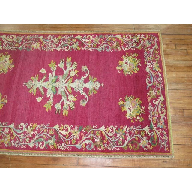 Early 20th Century Zabihi Collection Stunning Raspberry Turkish Ghiordes Floral Carpet - 3'9" x 6' For Sale In New York - Image 6 of 6