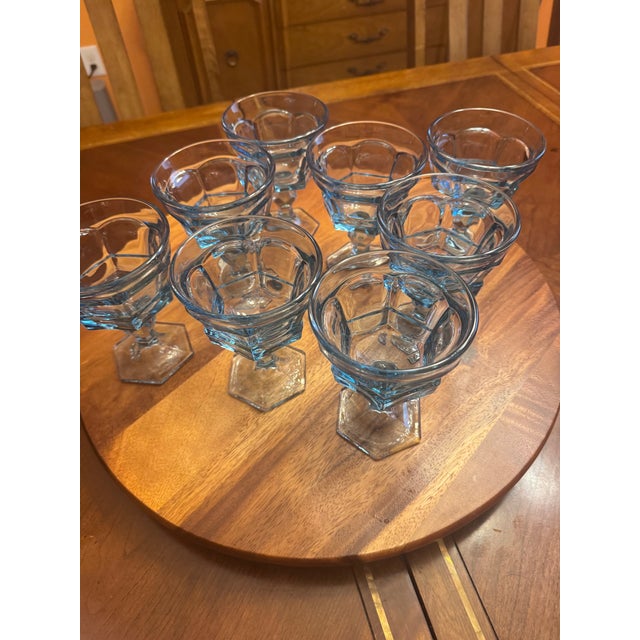 This set of 7 Fostoria Champagne/Tall Sherbet Glasses features a classic swirl pattern on elegant blue glass, perfect for...