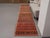 Vintage Hand-Knotted runner rug is a semi-antique vintage area rug. The '70s Eastern region of Anatolia's unique rug is...